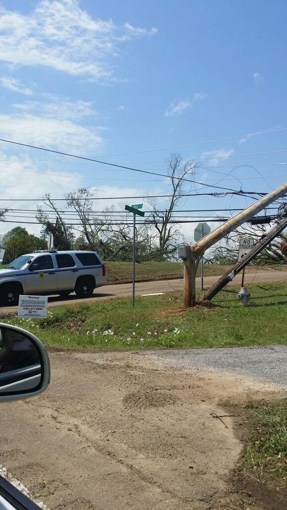 Broken trees, down power lines, and twisted street signs...never have I ever witnessed such a thing in person.