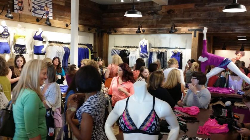 I spy a cute bikini top peaking out of the crowd at the Athleta Preview Party *wink* 